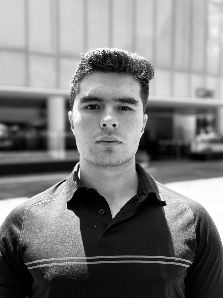 Francisco Mustico outdoors in a campus setting